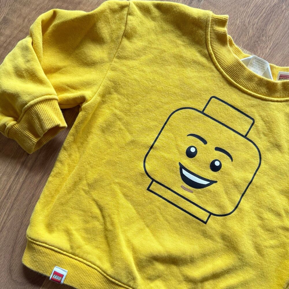 H&M LEGO brick head yellow sweater